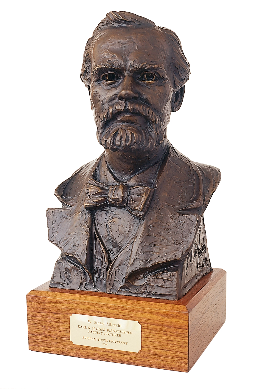An award with a bust of Karl G. Maeser and a plaque that reads "W. Steve Albrecht, Karl G. Maeser Distinguished Faculty Lecturer, Brigham Young University, 2004."