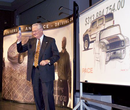 President Bateman receiving a donation