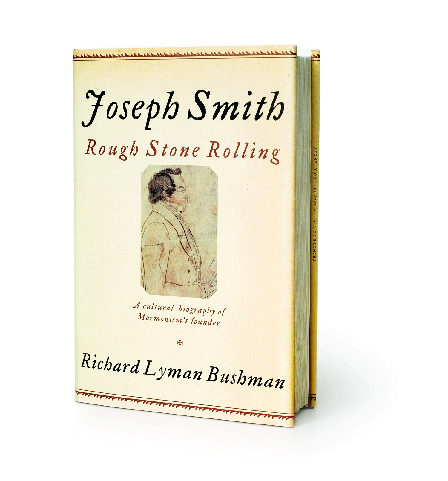 A book with an illustration of Joseph Smith on the cover. the cover text reads "Joseph Smith: Rough Stone Rolling. A cultural biography of Mormonism's founder. Richard Lyman Bushman."