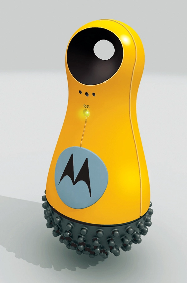 A pearl-shaped yellow contraption with a black bulb on the bottom.