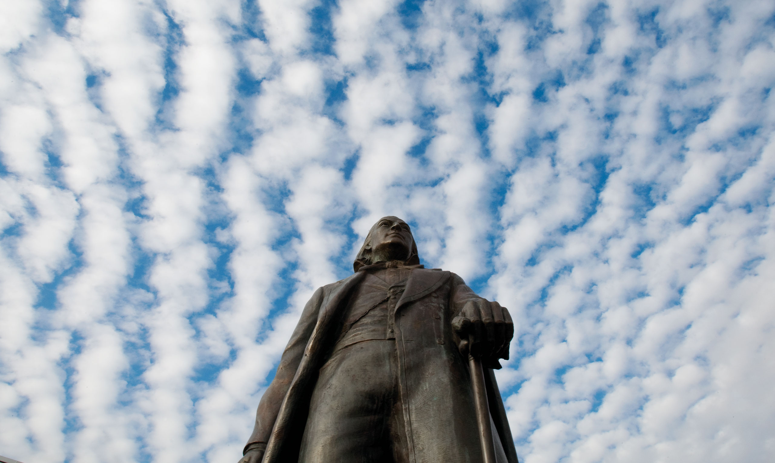 a shot looking up at the campus statue of Brigham Young
