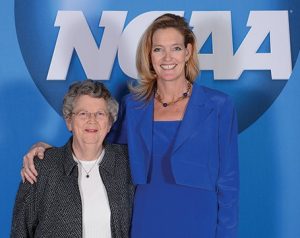 A volleyball superstar at BYU during the 1980s, Dylann Duncan Ceriani (above) added to her collection of honors by bringing home a Silver Anniversary Award from the NCAA (right), accompanied by her former coach Elaine Michaelis.