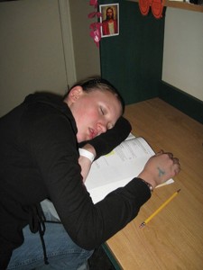 Laura Larsen falls asleep while studying for classes.