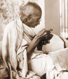 Gandhi reading