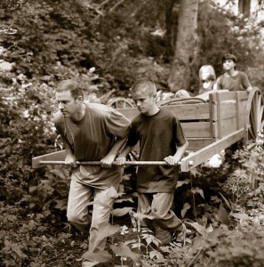 Family pulling a handcart