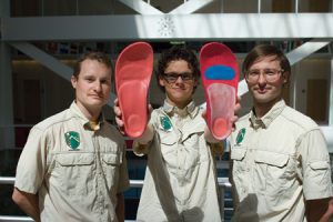 Bret Rasmussen (center) and his fellow Core Footwear founders, Chad Rasmussen (left) and T. Cody Hughes, won this year's Utah Entreprenurial Challenge by Fashioning a custom business plan around a lightweight outdoor shoe with a moldable misdsole made from memory foam. 