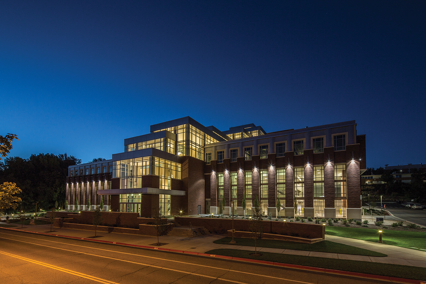 The new Life Science Building lit up at night.