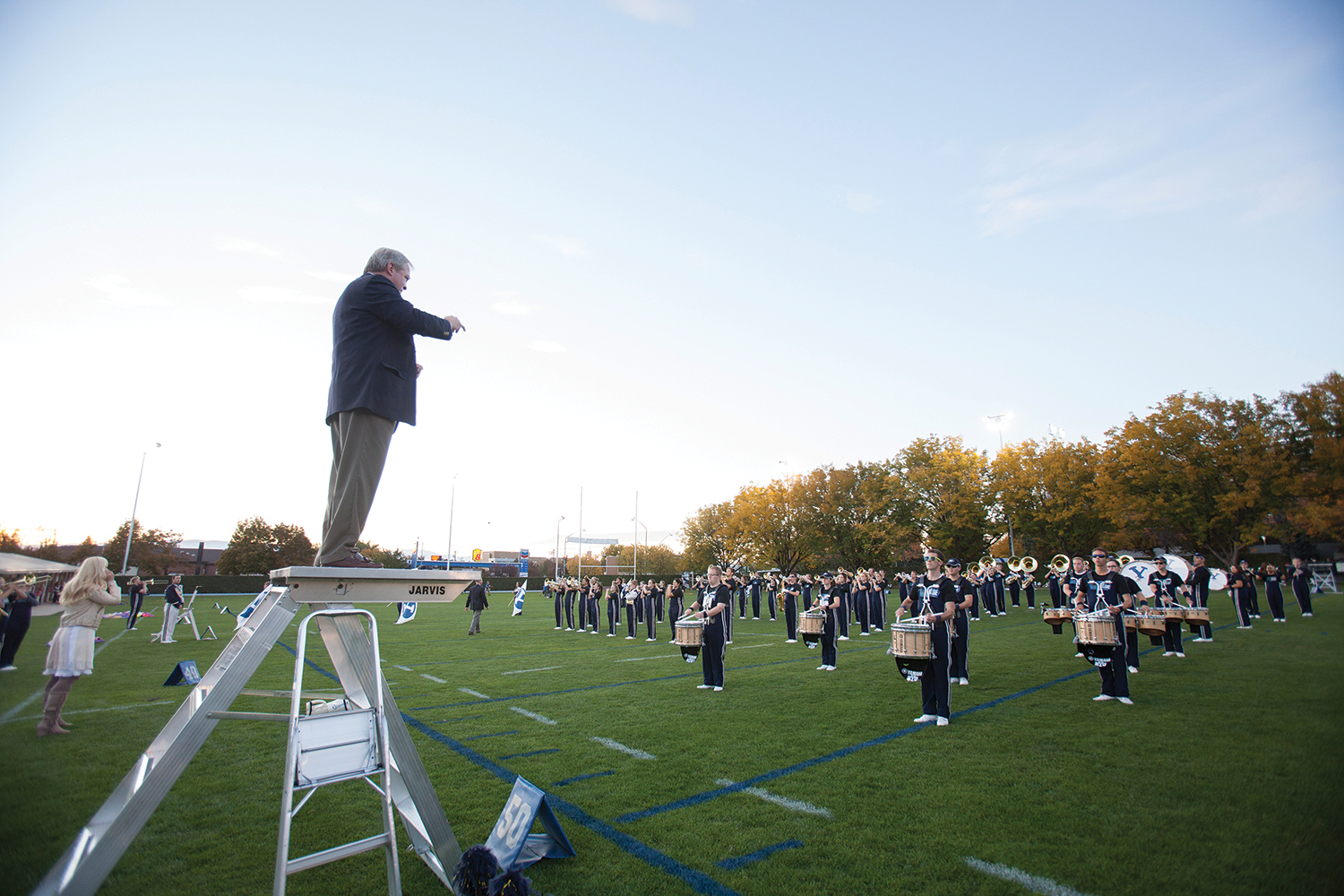 The BYU Marching Band prepares before the kickoff of a football game.