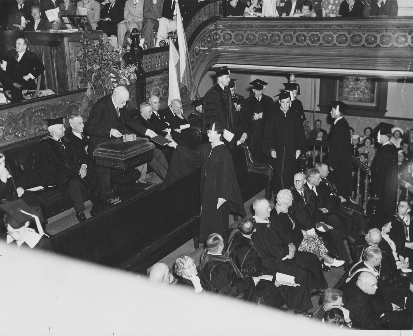 President Heber J. Grant hands out diplomas at a 1930s BYU graduation.