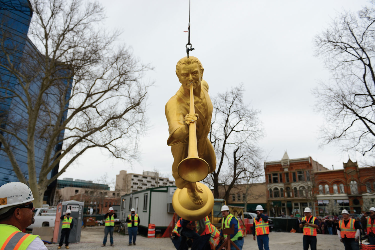 A shot of the angel Moroni statue being lifted.