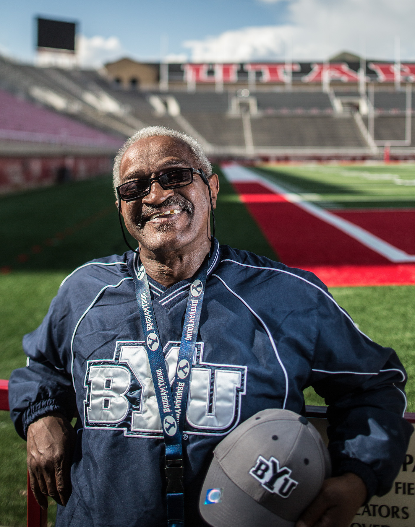 BYU super fan Gilbert WIlliams stands out at Utah's football stadium.