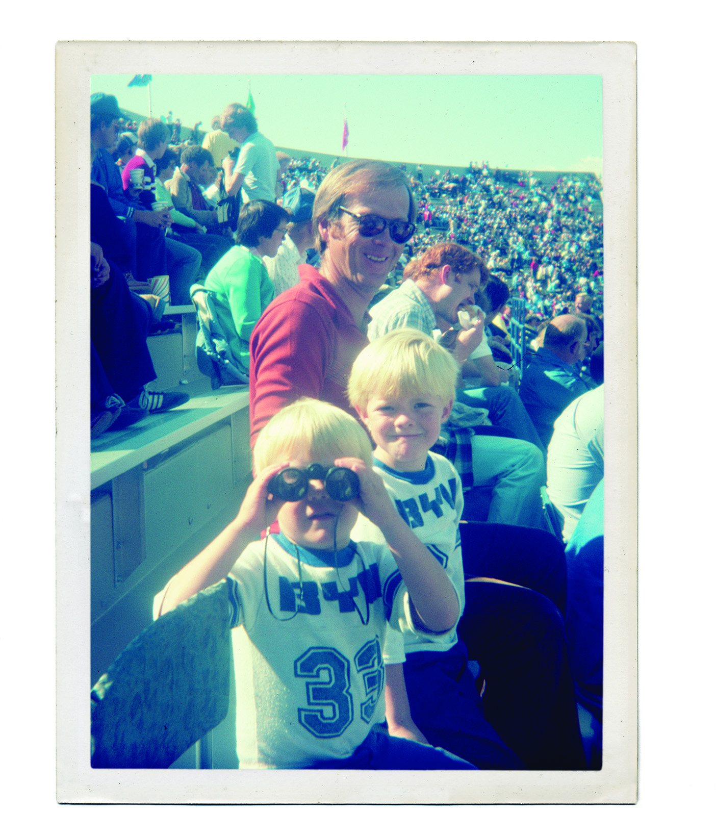 The author&rsquo;s brothers at a BYU home game with their father, Raymond J. Felix.