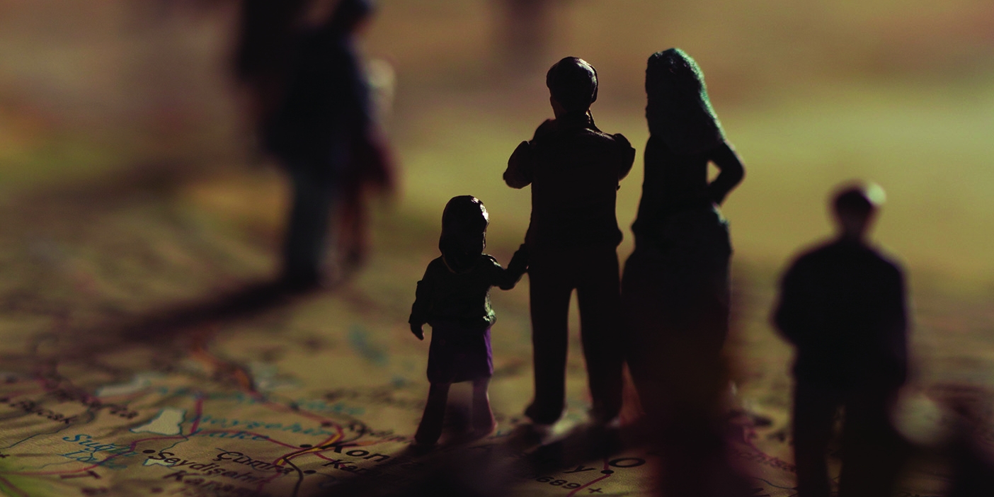 Close up of shadowy figurines on a map