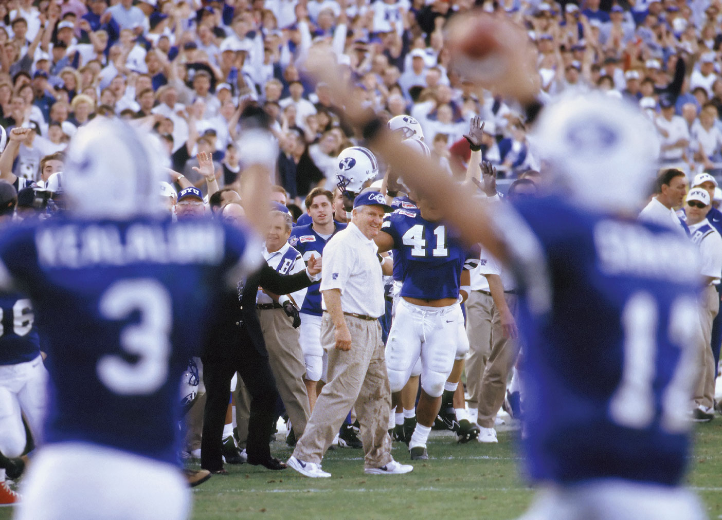 After the Cotton Bowl victory in 1996, an exultant team celebrates around Coach R. LaVell Edwards.