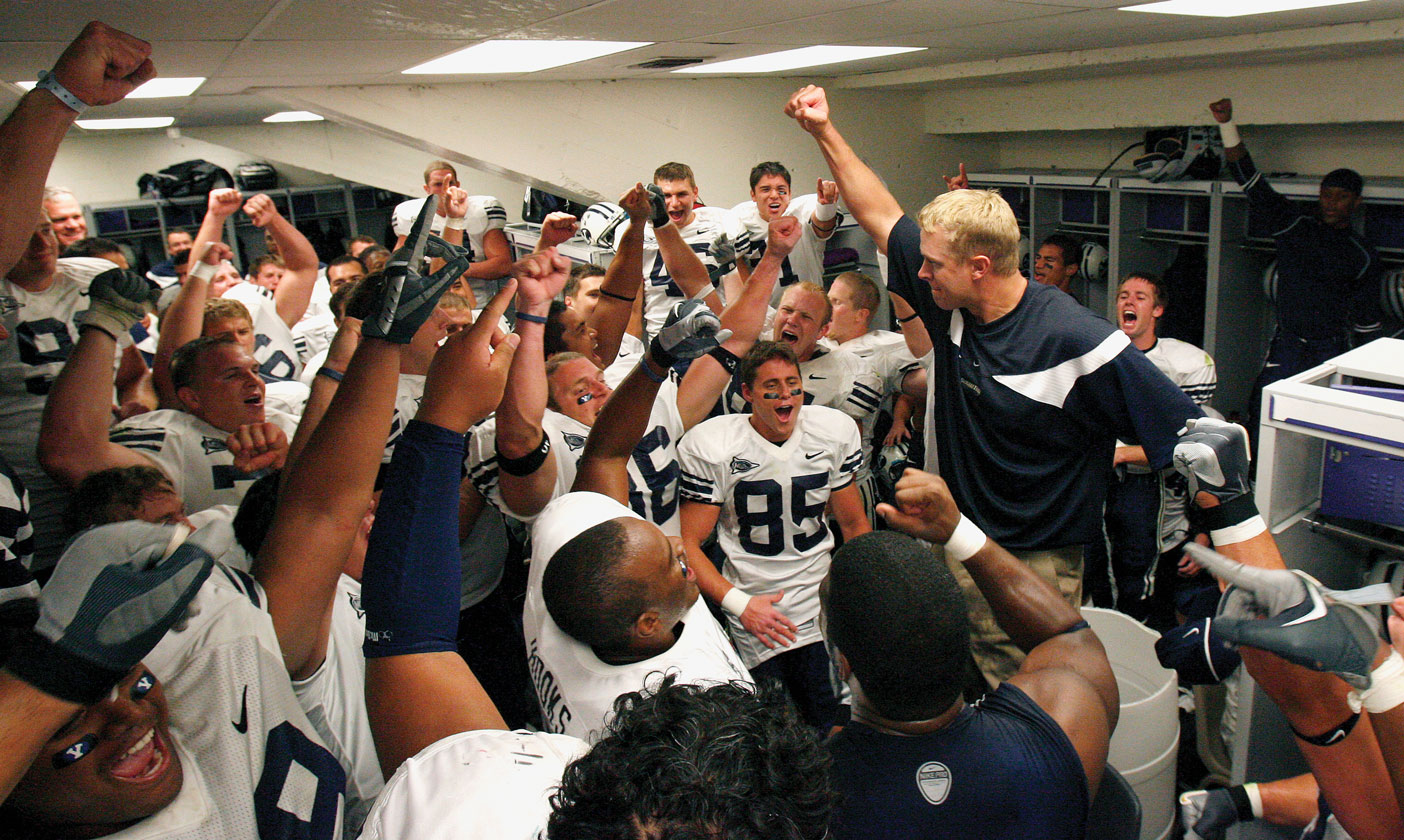Coach Bronco Mendenhall congratulates the team after a dominant win over TCU in 2006.