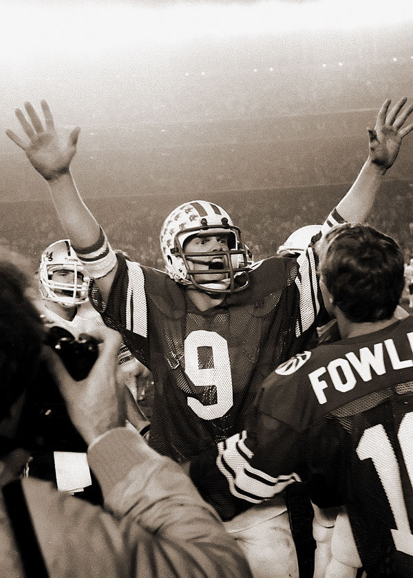Quarterback Jim McMahon celebrates after a Holiday Bowl victory against Washington State in 1981.