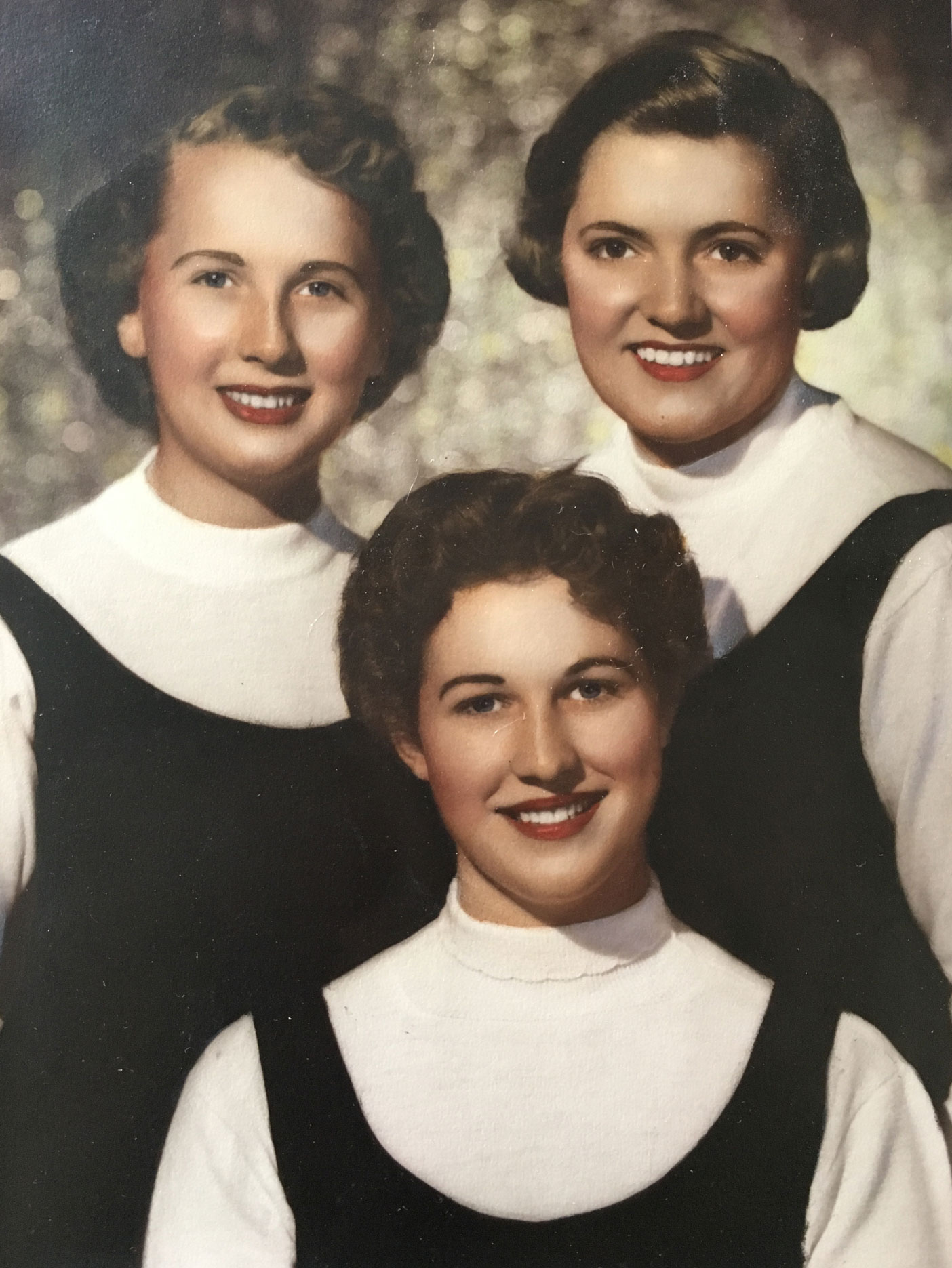 Sharon Senecal, Dorene Sheldon (bottom), and Kay Hansen take a portrait in matching jumpers. Photo courtesy of Kay Hansen.