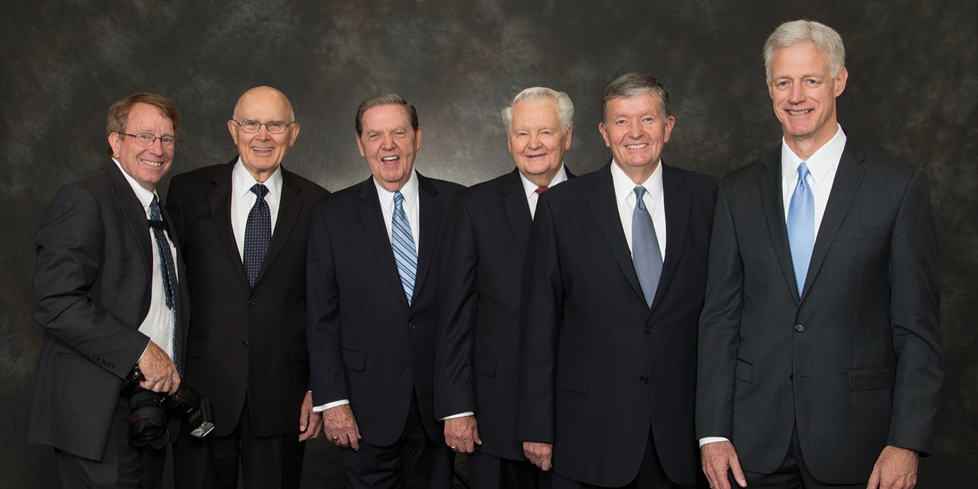 Mark Philbrick poses with five of the six BYU presidents he served under