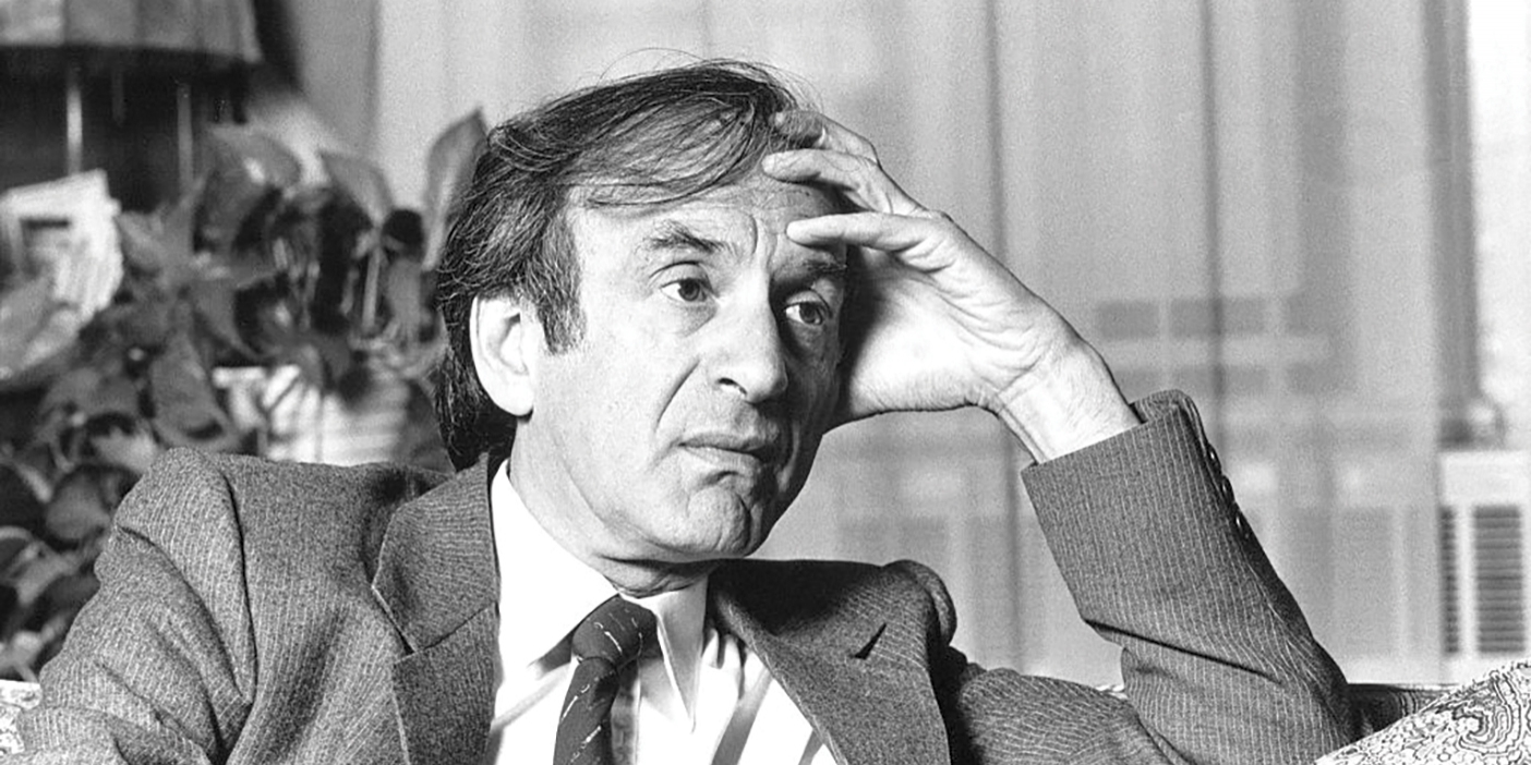 Elie Wiesel, pictured sitting on a couch, delivered this forum at BYU in 1985.