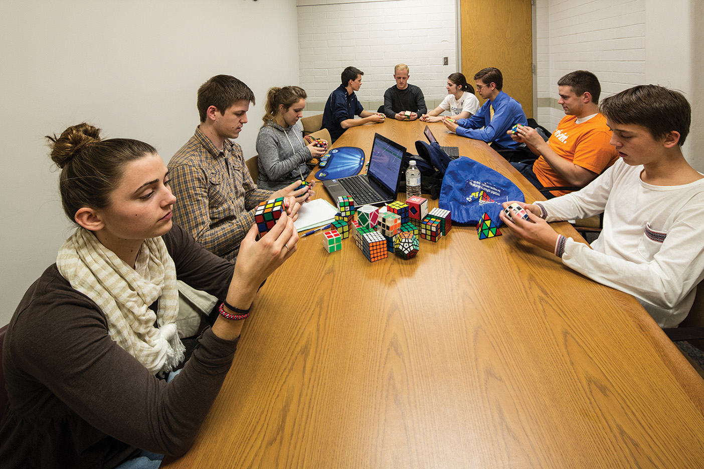 The Rubik's Cube Club works hard to pratice their cube-solving techniques.