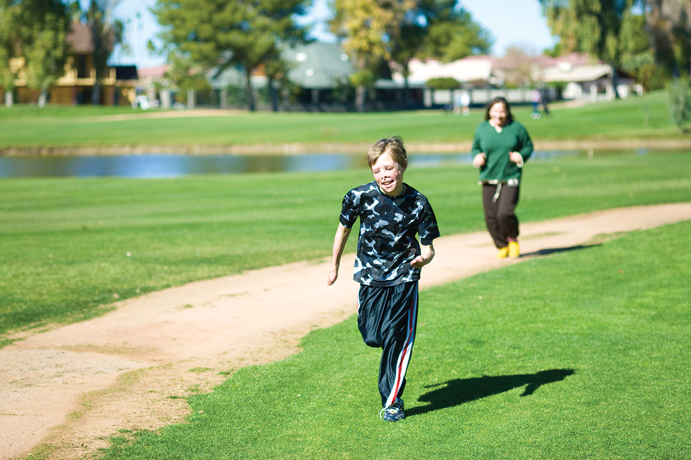 Marius running in a field