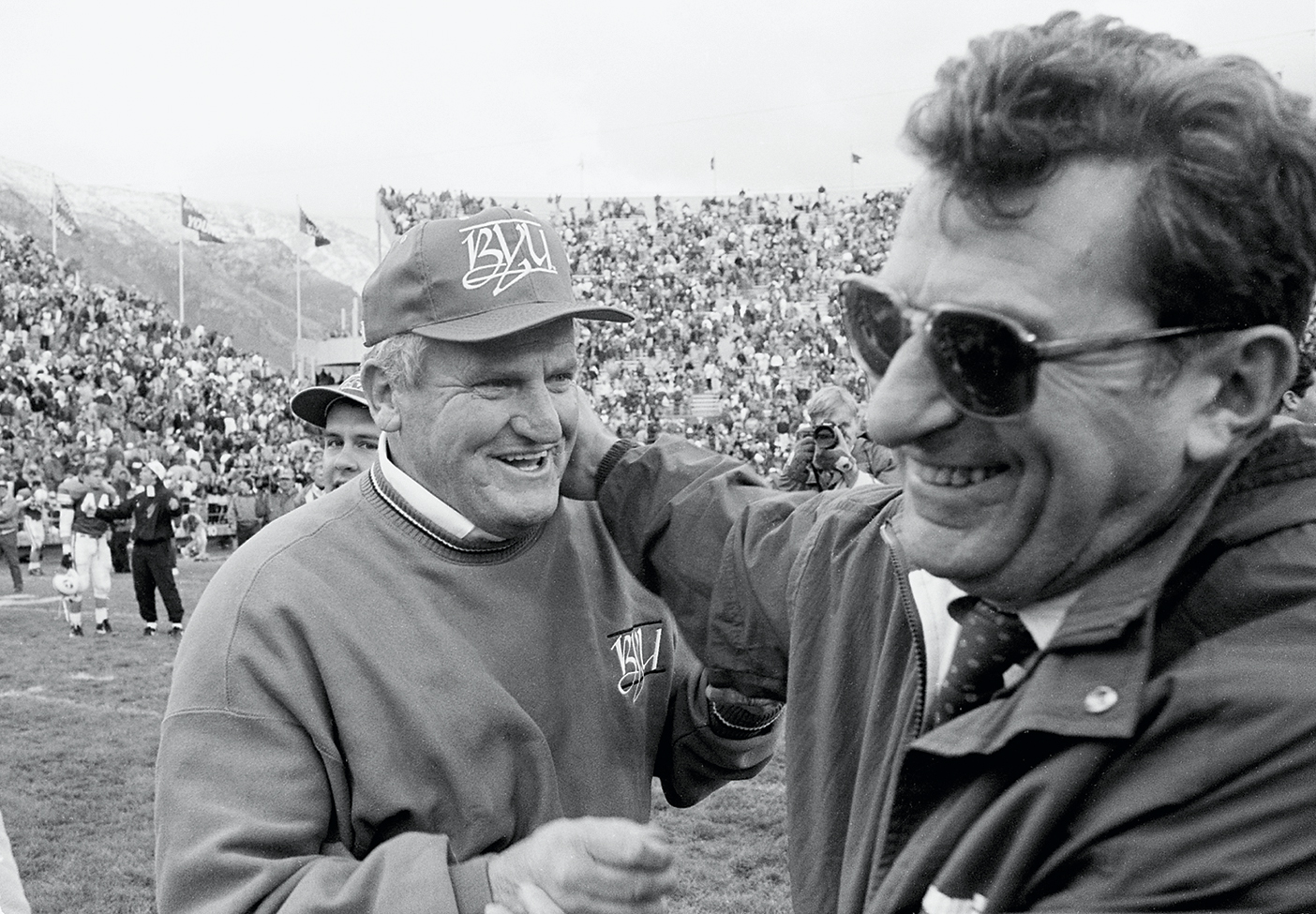 LaVell Edwards with Joe Paterno on a football field
