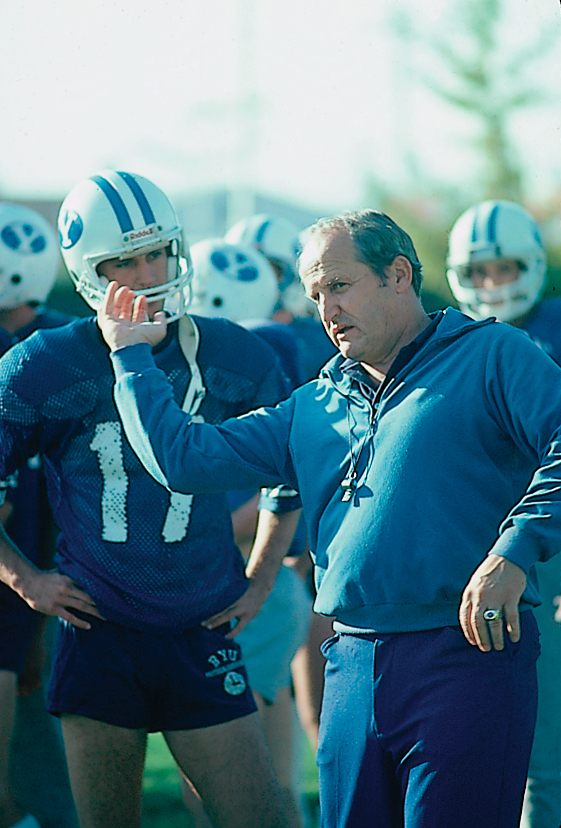 LaVell Edwards with a player