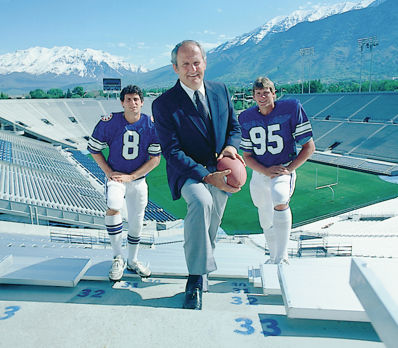 LaVell Edwards on the bleachers of the football field