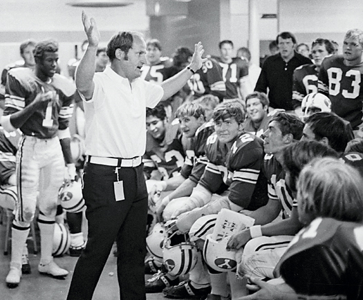 LaVell Edwards talks to the team in the locker room
