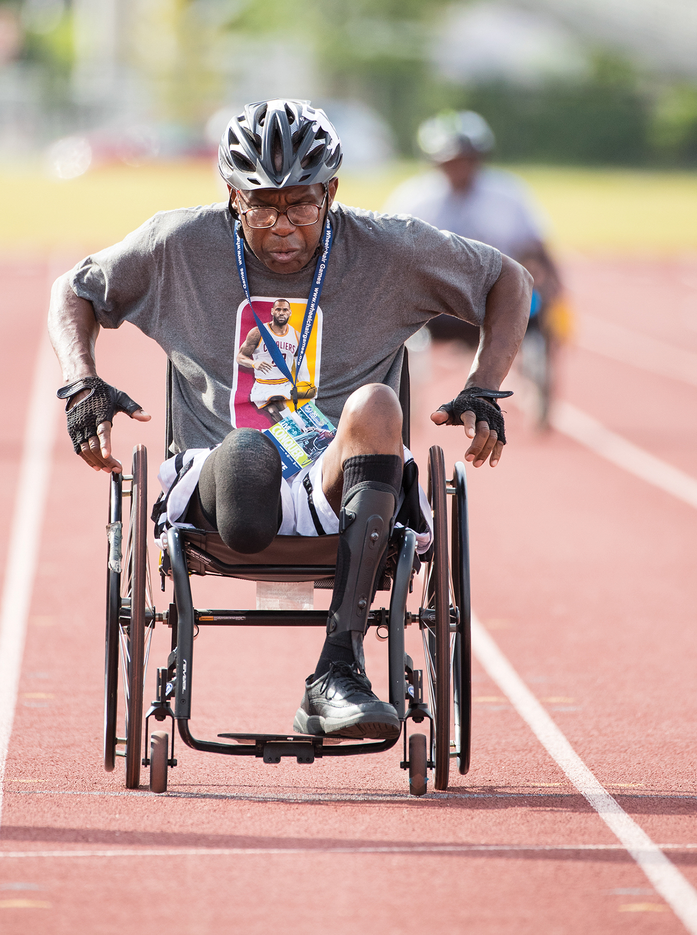 man in wheelchair on a track