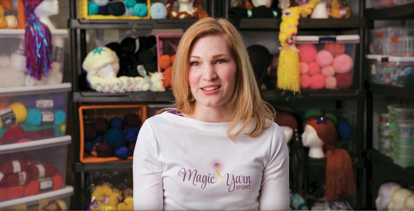 Holly Christensen surrounded by yarn