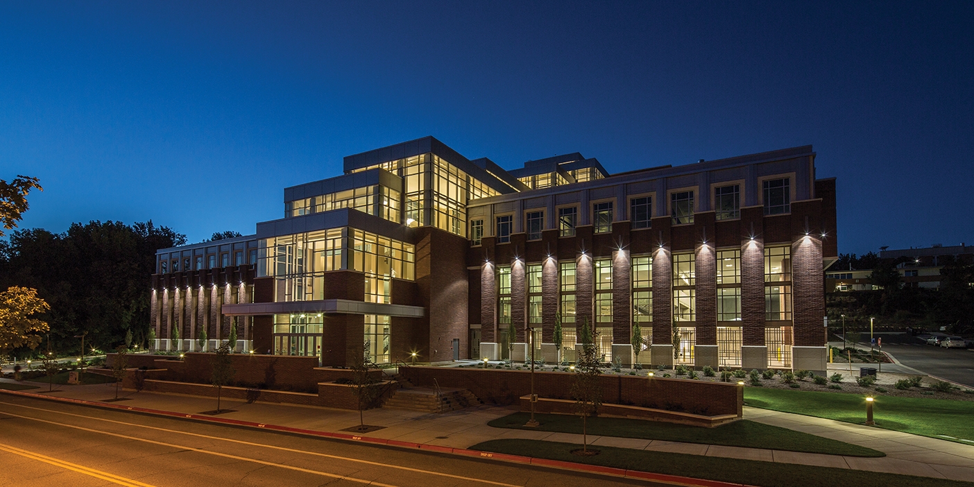 The new Life Science Building lit up at night.