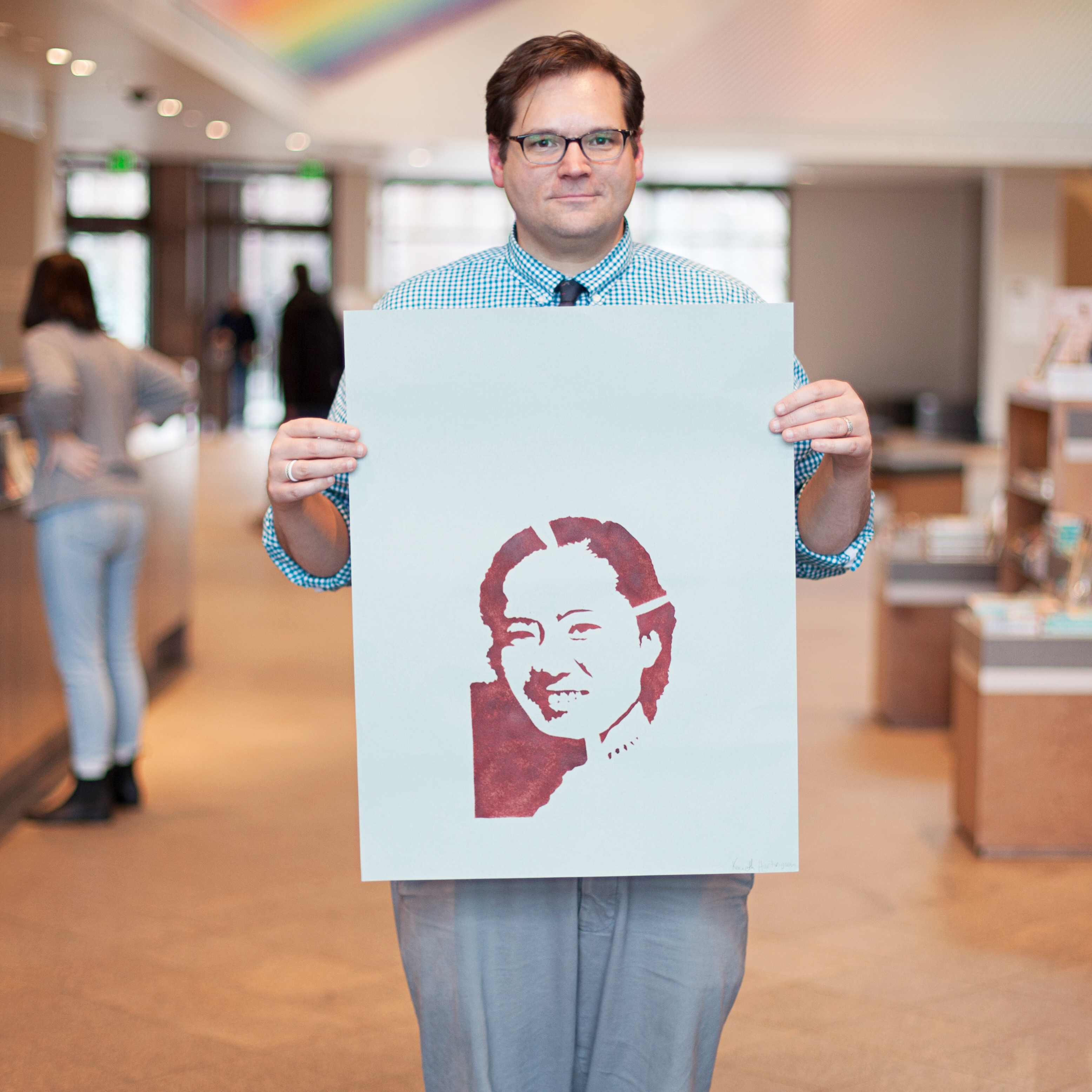 Kenneth Hartvigsen holds his stencil of Chien-Shiung Wu