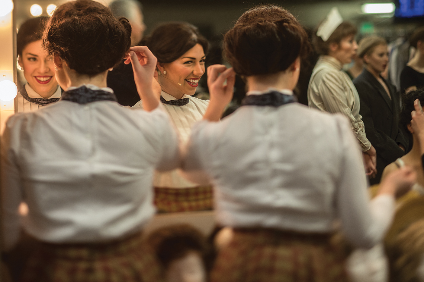 The two Mary Poppinses of BYU's production of Mary Poppins in the dressing room, getting ready for the stage.