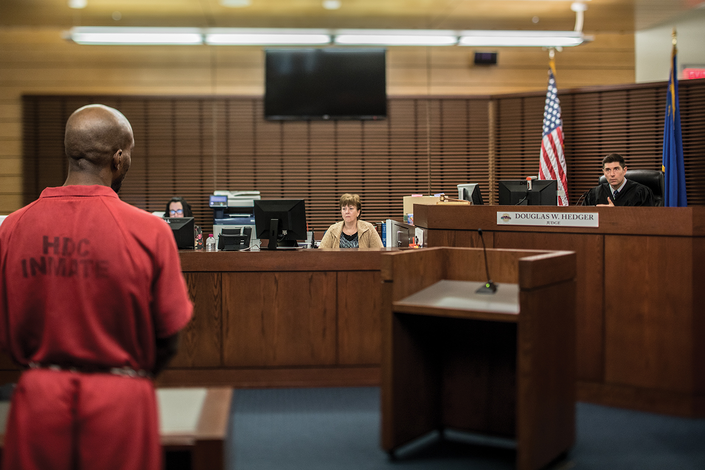 man in handcuffs in courtroom