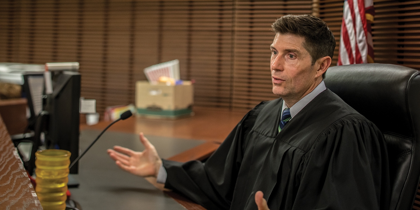 Judge Hedger at his desk