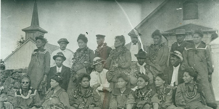 Hawaiian saints gather in front of LDS Church building.