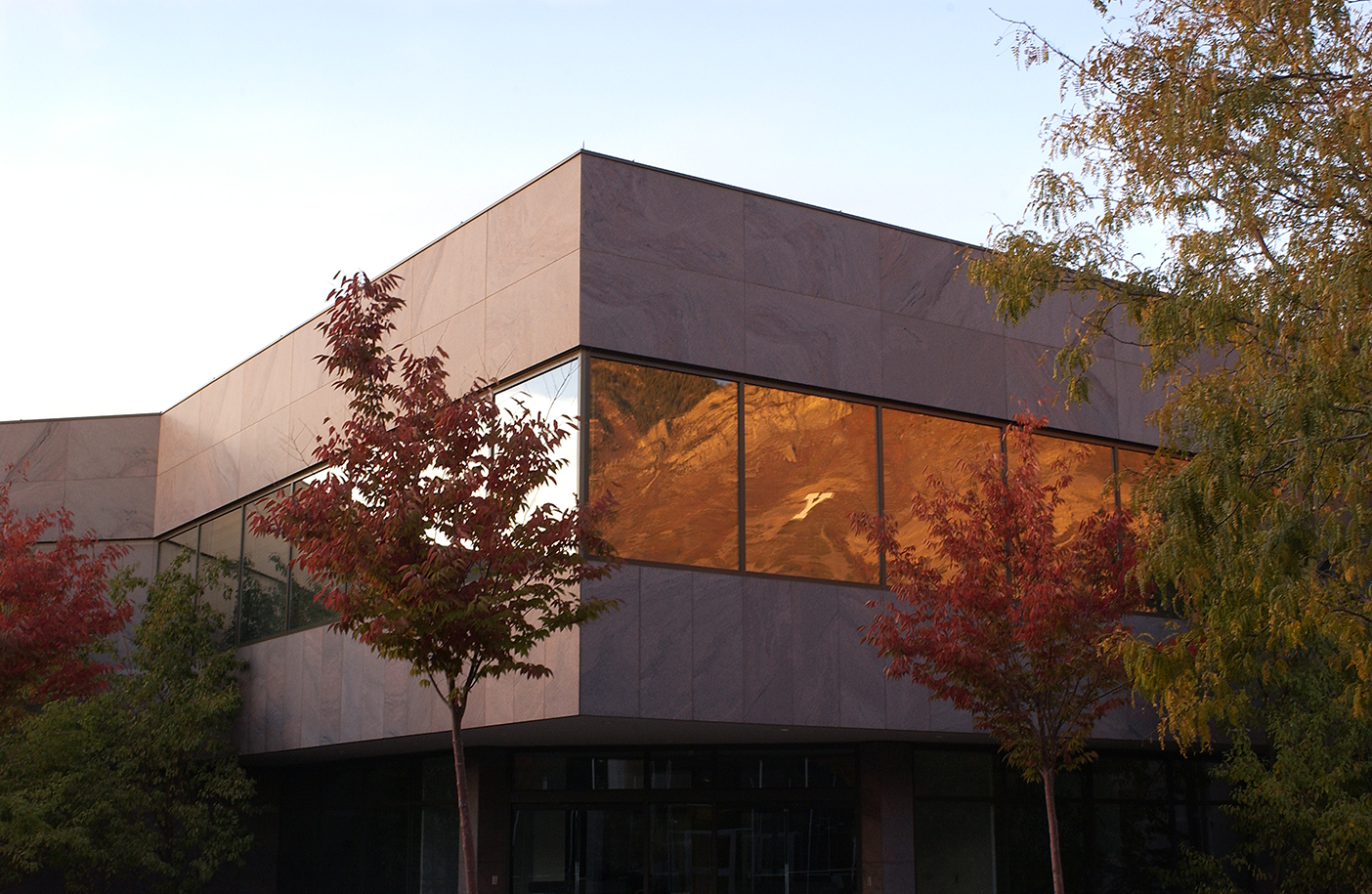 Museum of Art (MOA) with Y mountain reflected in the window or the garden pool.