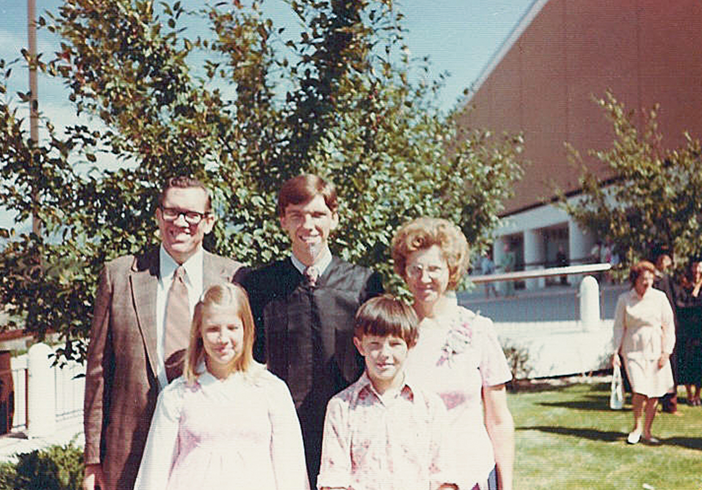Christensen at his graduation with his parents and two siblings
