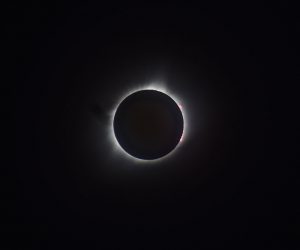 The sun eclipsed totally by the moon.