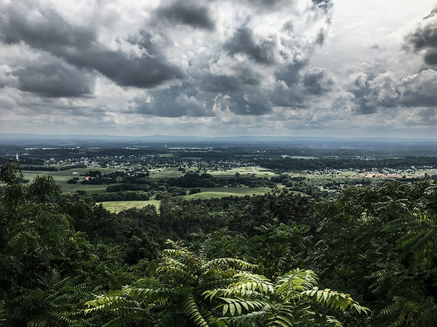 Clouds and green vegetation in the hills of West Virginia.