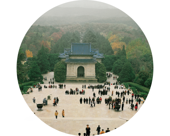 A wide shot of the Sun Yat-sen Memorial with trees in the background