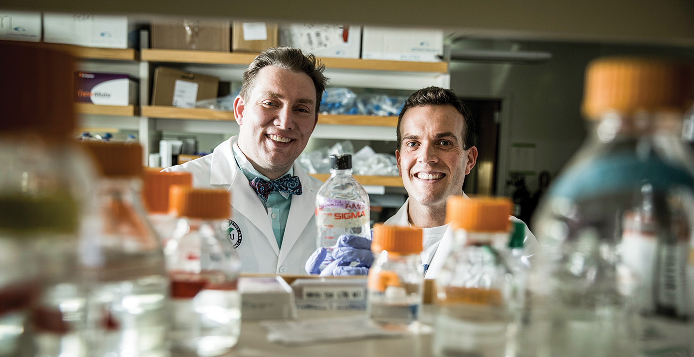 Jeffery Tessem and Thomas Rowley in their research lab