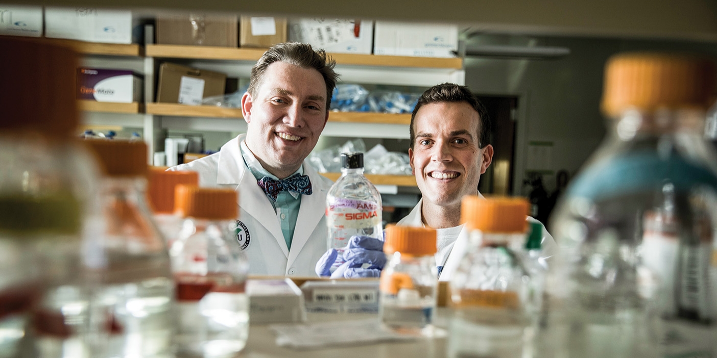 Jeffery Tessem and Thomas Rowley in their research lab