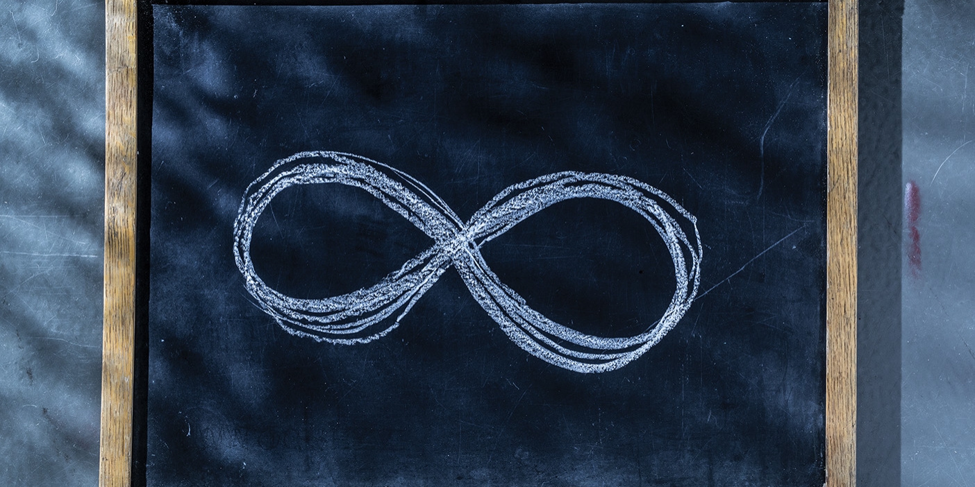 Chalkboard drawing of the symbol for infinity.