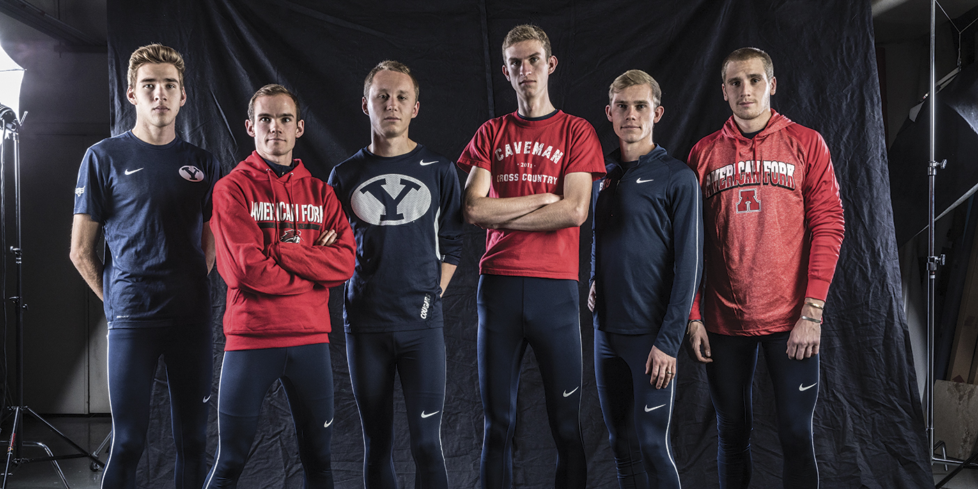 Cross Country team stand in a line inside the studio.