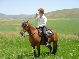 Jon Heder, as Napoelon, gets a drink of water while atop the stallion he tamed for Kip and LaFawnduh's wedding.