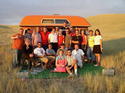 The team stands in front of the Uncle Rico van they got from a local named Pickles.