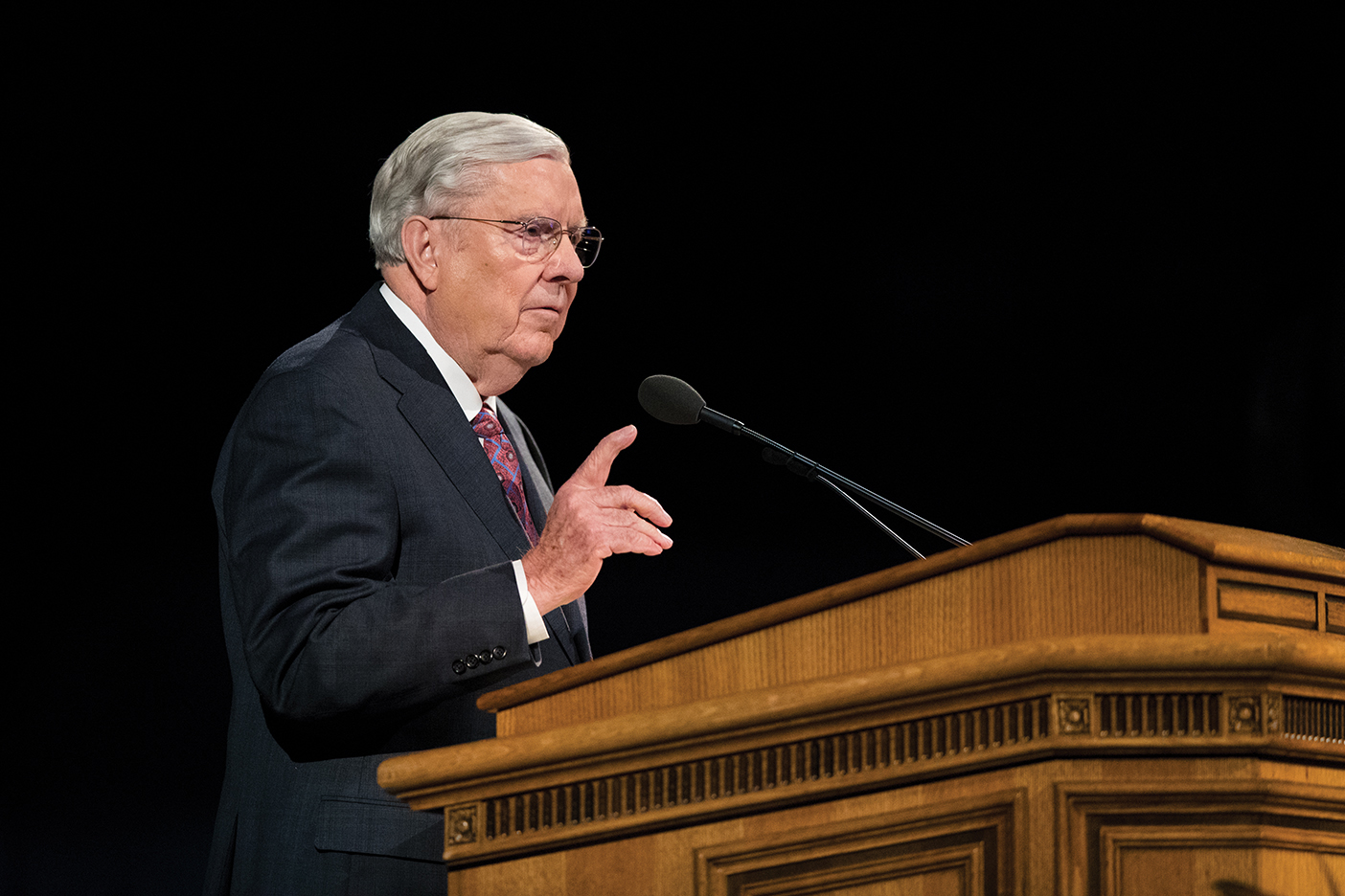 Elder M. Russell Ballard of the Quorum of the Twelve Apostles speaks at a BYU Devotional in the Marriott Center.