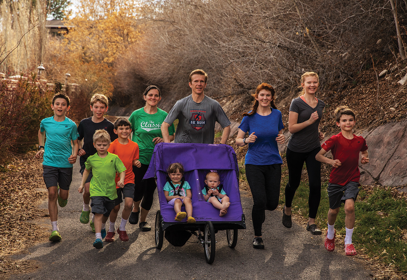 The large Pachev family out on a run, all wearing Croc shoes.